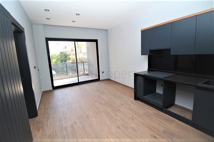 موقع مميز - مجمع جديد -شقة 1+1 في مركز الانيا 