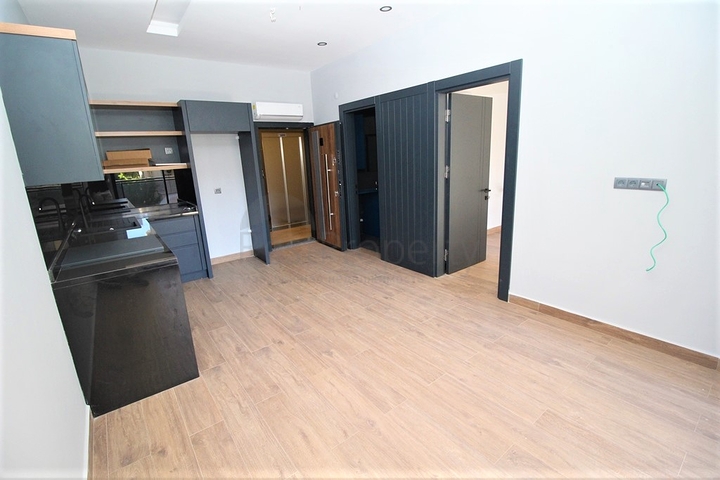 موقع مميز - مجمع جديد -شقة 1+1 في مركز الانيا 