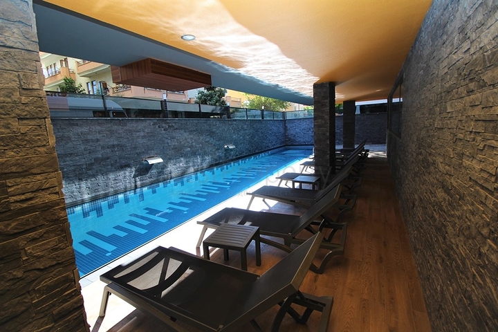 موقع مميز - مجمع جديد -شقة 1+1 في مركز الانيا 