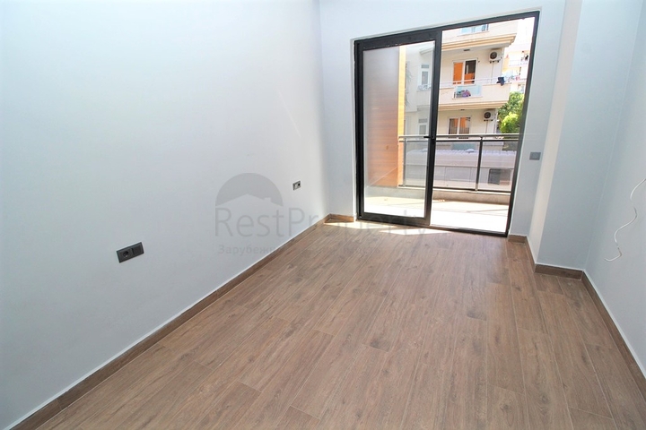 موقع مميز - مجمع جديد -شقة 1+1 في مركز الانيا 