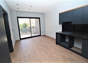 موقع مميز - مجمع جديد -شقة 1+1 في مركز الانيا 