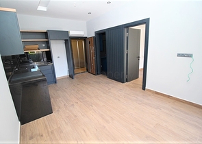 موقع مميز - مجمع جديد -شقة 1+1 في مركز الانيا 