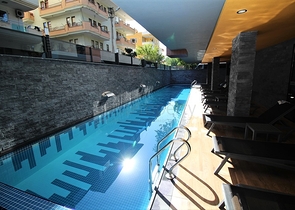 موقع مميز - مجمع جديد -شقة 1+1 في مركز الانيا 