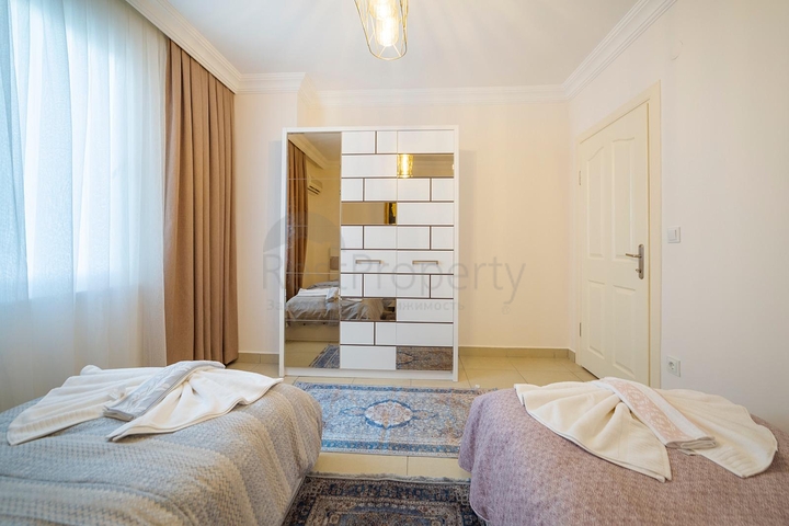 اطلالة مفتوحة -شقة غرفتين وصالة مع الاثاث - ضمن مجمع - في مهموتلار / الانيا 