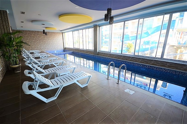 مع تراس واسع - شقة دوبلكس ارضية - ضمن مجمع فخم - في كاستل / الانيا 