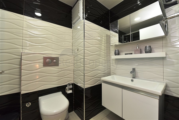 مع تراس واسع - شقة دوبلكس ارضية - ضمن مجمع فخم - في كاستل / الانيا 