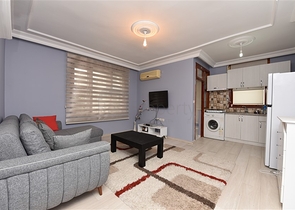 بسعر اقتصادي - شقة غرفة وصالة مع الاثاث - في مركز الانيا 