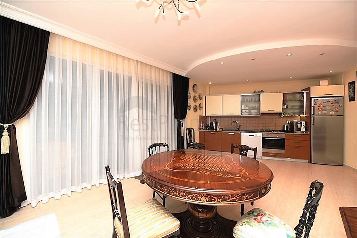 مع حديقة وتراس واسع - شقة 2 غرفة وصالة - ضمن مجمع على النهر مباشرة - في توسمور / الانيا 