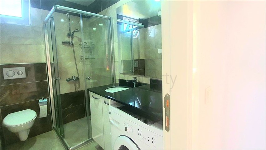 شقة غرفتين وصالة مؤثثة - ضمن مجمع يضم كافة الخدمات - في افسلار / الانيا 