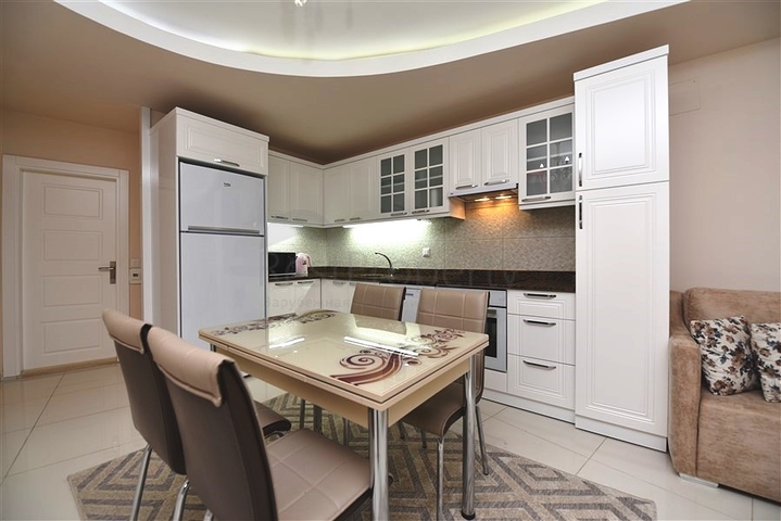 مع تراس - شقة غرفتين وصالة - مفروشة - ضمن مجمع قريب من البحر - في افسلار / الانيا 