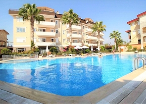 مع تراس - شقة غرفتين وصالة - مفروشة - ضمن مجمع قريب من البحر - في افسلار / الانيا 