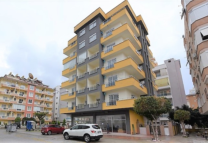 ضمن بناء جديد - شقة غرفة وصالة - واسعة - قريبة من البحر - في مهموتلار / الانيا 