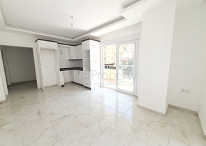 ضمن بناء جديد - شقة غرفة وصالة - واسعة - قريبة من البحر - في مهموتلار / الانيا 