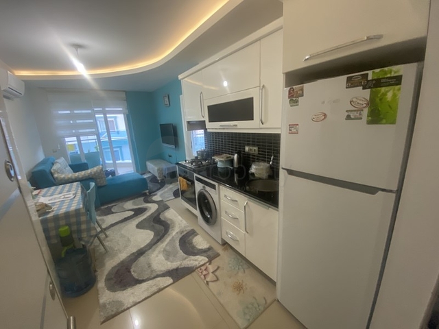 ضمن مجمع سكني عائلي - شقة غرفة وصالة -في مهموتلار / الانيا 