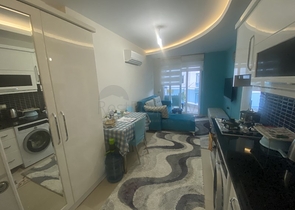 ضمن مجمع سكني عائلي - شقة غرفة وصالة -في مهموتلار / الانيا 