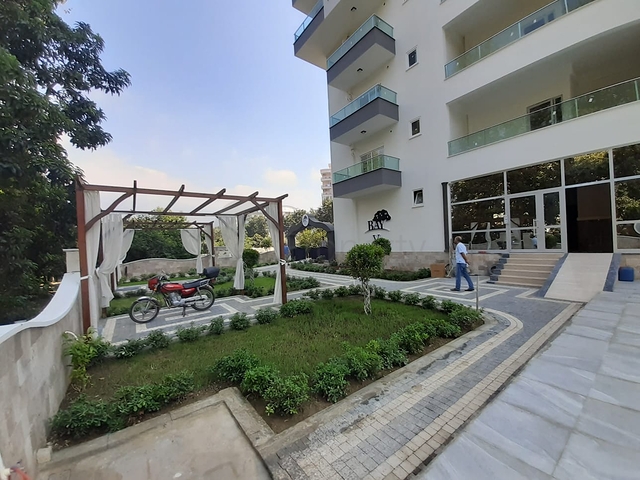 شقق قريبة من البحر - باسعار مناسبة - تصميم 1+1 - في مهموتلار / الانيا 