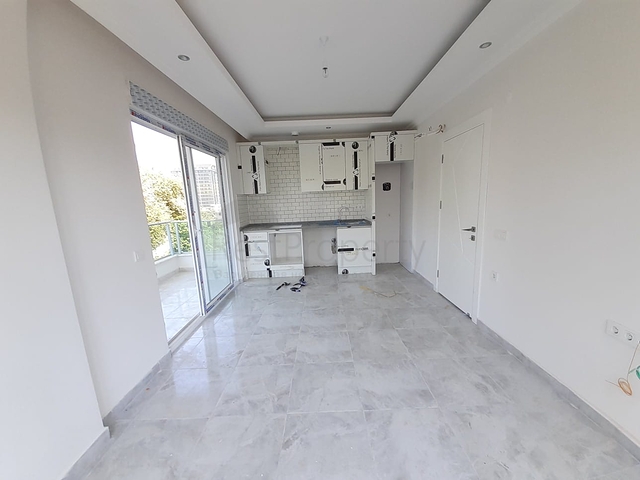 شقق قريبة من البحر - باسعار مناسبة - تصميم 1+1 - في مهموتلار / الانيا 