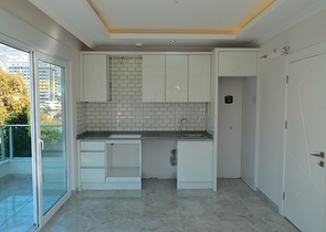 شقق قريبة من البحر - باسعار مناسبة - تصميم 1+1 - في مهموتلار / الانيا 