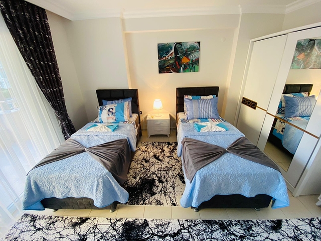 شقة مؤثثة - تصميم غرفتين وصالة - في منطقة مهموتلار الحيوية / مدينة الانيا 