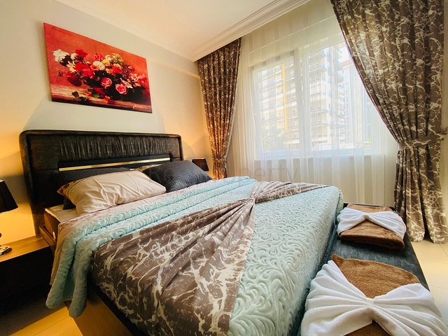 شقة مؤثثة - تصميم غرفتين وصالة - في منطقة مهموتلار الحيوية / مدينة الانيا 