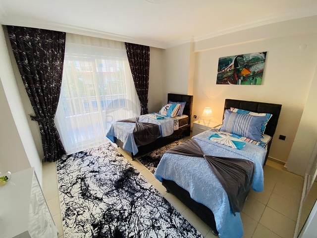 شقة مؤثثة - تصميم غرفتين وصالة - في منطقة مهموتلار الحيوية / مدينة الانيا 