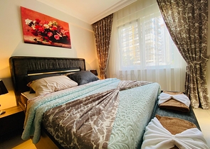 شقة مؤثثة - تصميم غرفتين وصالة - في منطقة مهموتلار الحيوية / مدينة الانيا 