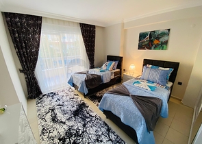 شقة مؤثثة - تصميم غرفتين وصالة - في منطقة مهموتلار الحيوية / مدينة الانيا 