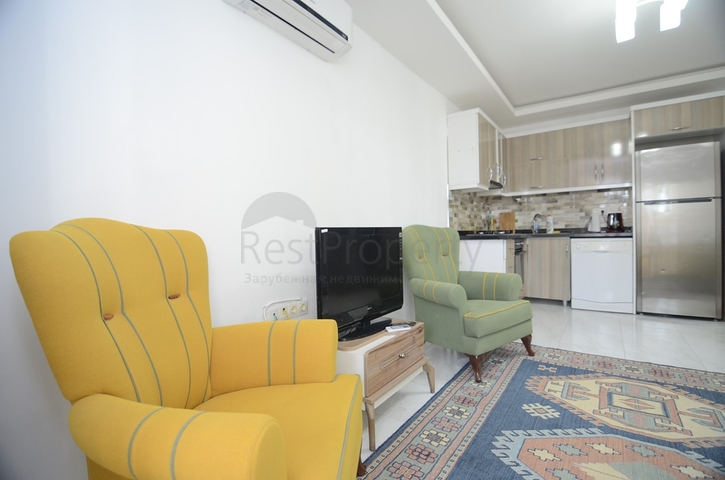 بسعر اقتصادي - شقة غرفة وصالة مع بالكون مغلق - مؤثثة -ضمن مجمع في مهموتلار / الانيا 