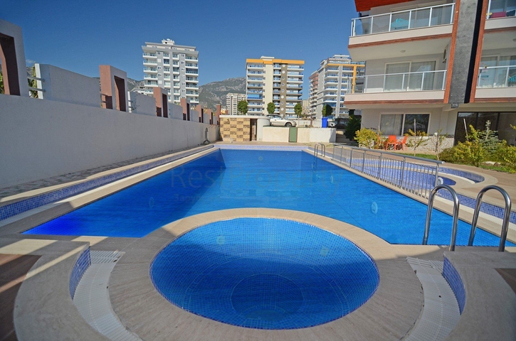 شقة انيقة - تصميم غرفتين وصالة - مع الاثاث - في مهموتلار / الانيا 