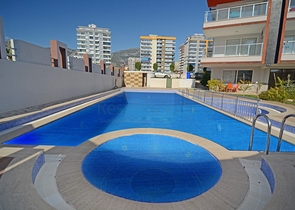 شقة انيقة - تصميم غرفتين وصالة - مع الاثاث - في مهموتلار / الانيا 