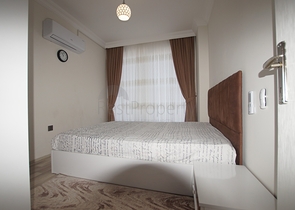 شقة انيقة - تصميم غرفتين وصالة - مع الاثاث - في مهموتلار / الانيا 