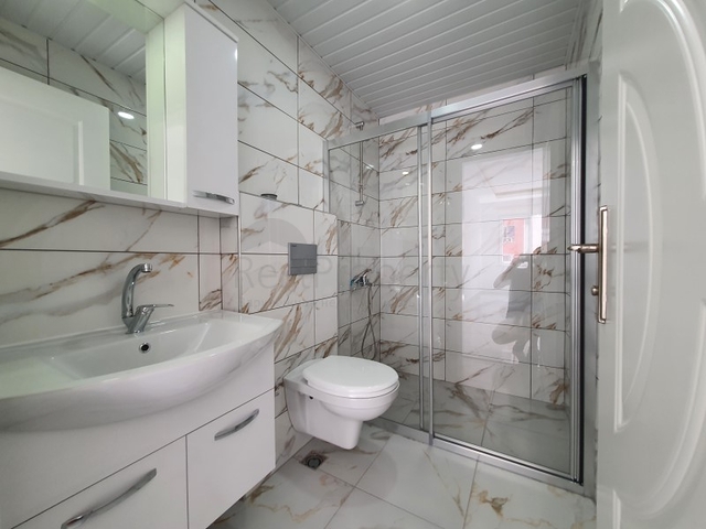 ضمن مجمع سكني حديث -شقة غرفتين وصالة مفروشة - في مهموتلار / الانيا 