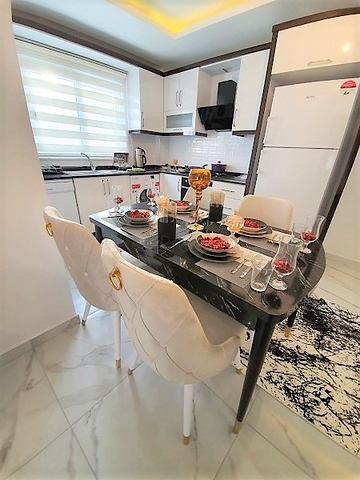 ضمن مجمع سكني حديث -شقة غرفتين وصالة مفروشة - في مهموتلار / الانيا 