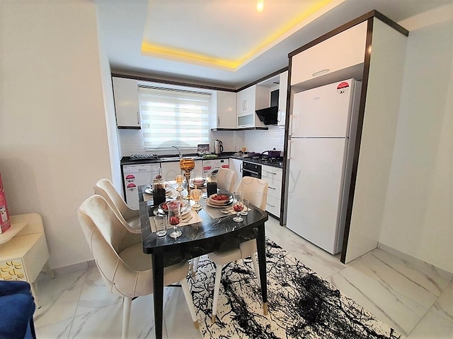 ضمن مجمع سكني حديث -شقة غرفتين وصالة مفروشة - في مهموتلار / الانيا 