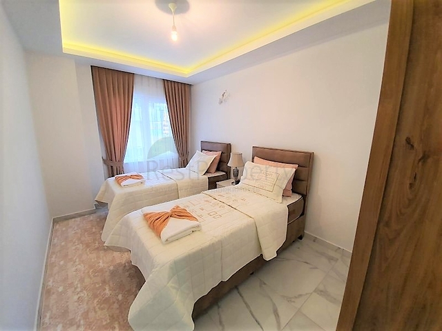 ضمن مجمع سكني حديث -شقة غرفتين وصالة مفروشة - في مهموتلار / الانيا 