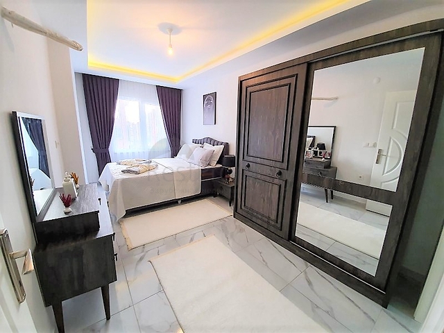 ضمن مجمع سكني حديث -شقة غرفتين وصالة مفروشة - في مهموتلار / الانيا 