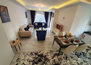 ضمن مجمع سكني حديث -شقة غرفتين وصالة مفروشة - في مهموتلار / الانيا 