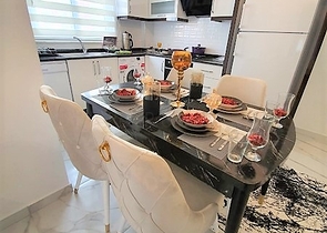 ضمن مجمع سكني حديث -شقة غرفتين وصالة مفروشة - في مهموتلار / الانيا 