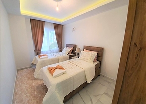 ضمن مجمع سكني حديث -شقة غرفتين وصالة مفروشة - في مهموتلار / الانيا 