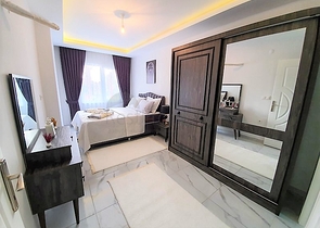 ضمن مجمع سكني حديث -شقة غرفتين وصالة مفروشة - في مهموتلار / الانيا 