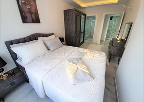 ضمن مجمع سكني حديث -شقة غرفتين وصالة مفروشة - في مهموتلار / الانيا 