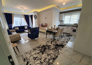 ضمن مجمع سكني حديث -شقة غرفتين وصالة مفروشة - في مهموتلار / الانيا 