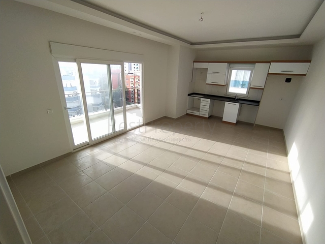 شقة غرفتين وصالة - على شارع بارباروس - في مهموتلار / الانيا 