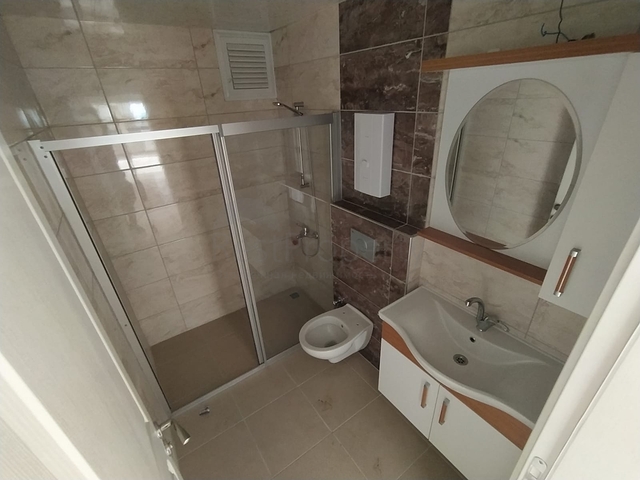 شقة غرفتين وصالة - على شارع بارباروس - في مهموتلار / الانيا 