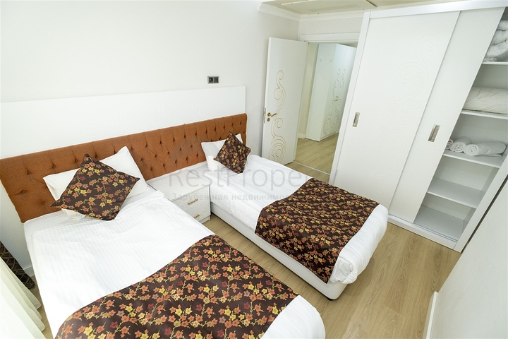 شقة 2 + 1 مع أثاث في مجمع مخطط فندقي في أنطاليا