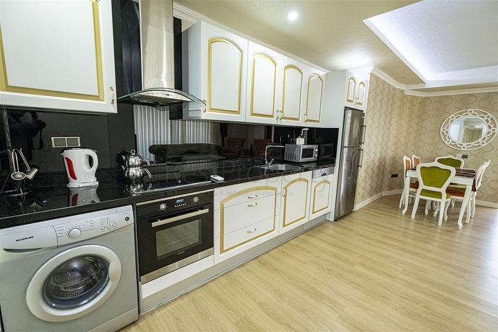 شقة 2 + 1 مع أثاث في مجمع مخطط فندقي في أنطاليا