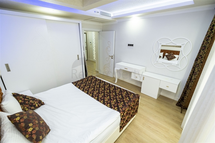 شقة 2 + 1 مع أثاث في مجمع مخطط فندقي في أنطاليا