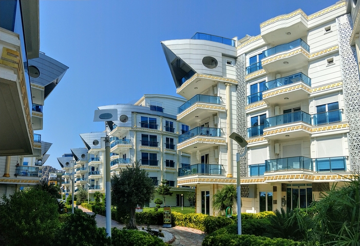 شقة 2 + 1 مع أثاث في مجمع مخطط فندقي في أنطاليا