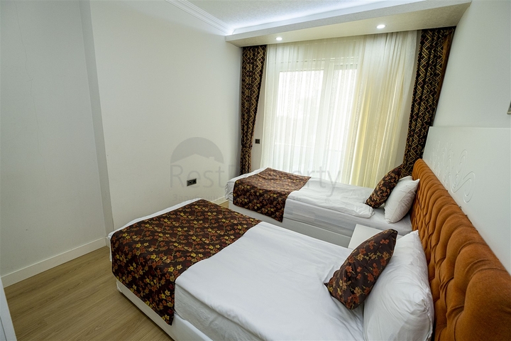 شقة 2 + 1 مع أثاث في مجمع مخطط فندقي في أنطاليا