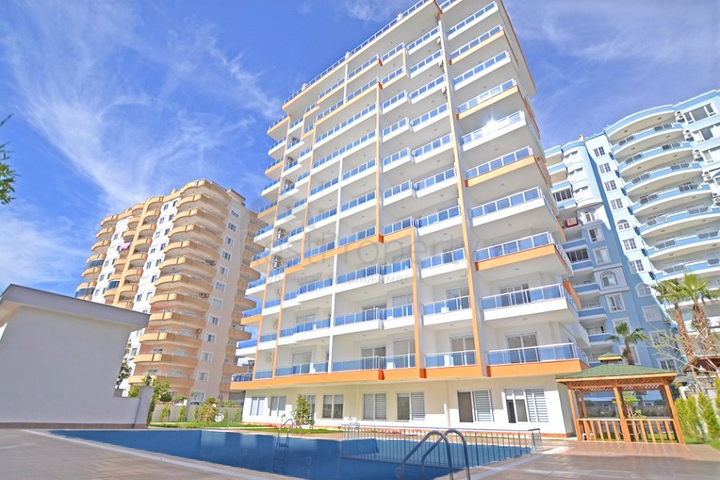 شقة غرفتين وصالة - ضمن مجمع سكني - قريب من البحر والخدمات - في مهموتلار / الانيا